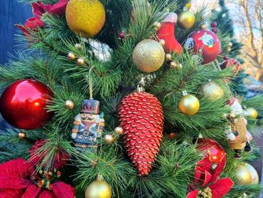 Luxury 7 foot vintage style Christmas tree with glass and tin ornaments on realistic pine - closeuo.