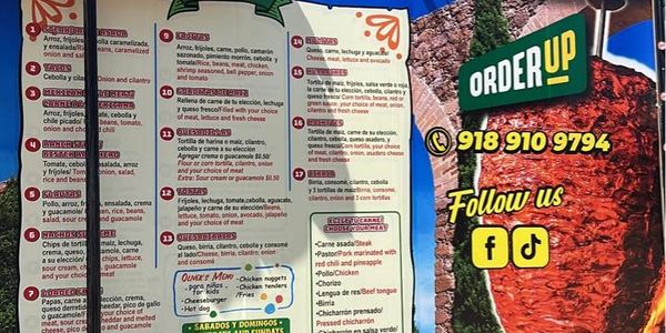 Colorful food truck menu with tacos and quesadillas at 2505 E Pine St Tulsa, OK.