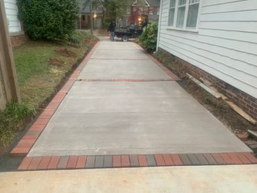 Concrete and brick driveway installation in Haynes Barton Raleigh North Carolina.