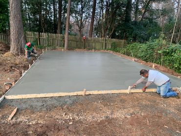 Concrete basketball court installation in Raleigh North Carolina.