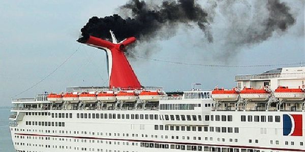 Passenger cruise ship discharging toxic sulfuric fumes into the atmosphere.