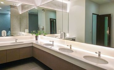 Clean and modern looking restroom with sinks and large mirrors