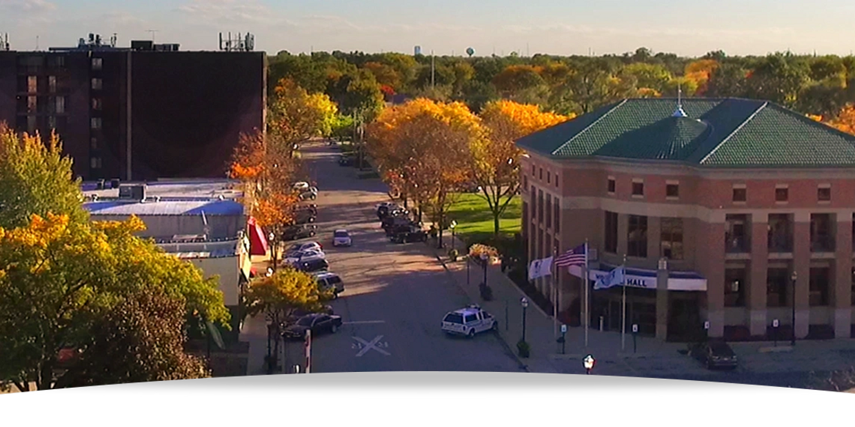 Overview of Downtown Bensenville, IL 60106 Village Hall during fall. 
