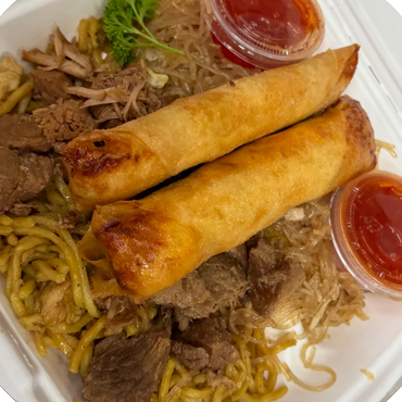 Up-close image of the Filipino plate. Featuring 2 Lumpia, Pancit, Bihon, Adobo, and Sweet Chili Sauce