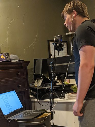Cameron Sloan working on vocals for the track Venom.