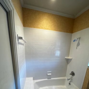 Tub and tile surround Reglazed.