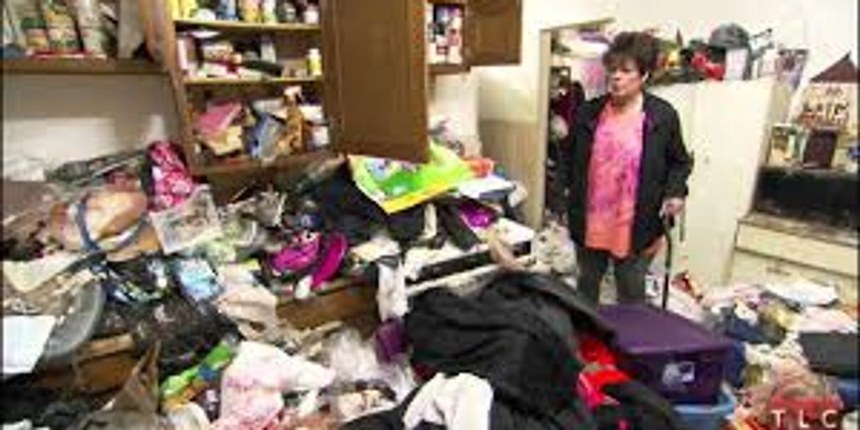 Women looking at massive clutter in house. Veterans Moving can handle any hoarder house. 