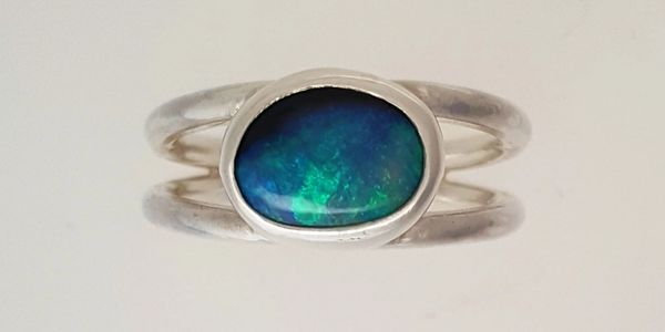 Natural Black Australian Opal in Sterling Silver Ring.
Hand made in Manitoba
Made in Canada