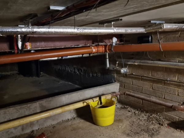 New gas pipes installed underneath a building