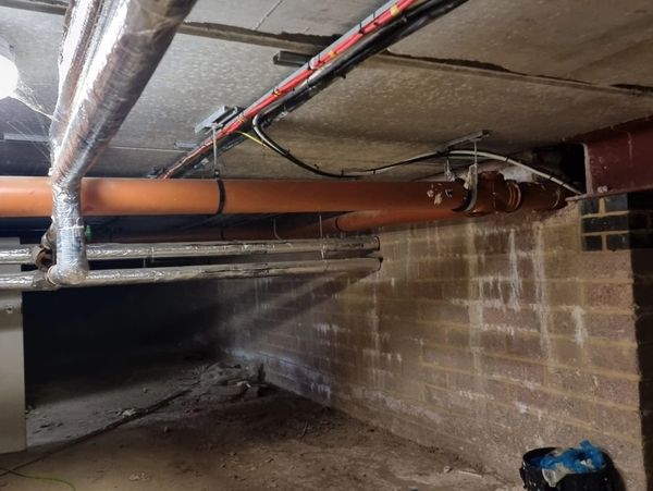 New gas pipes installed underneath a building