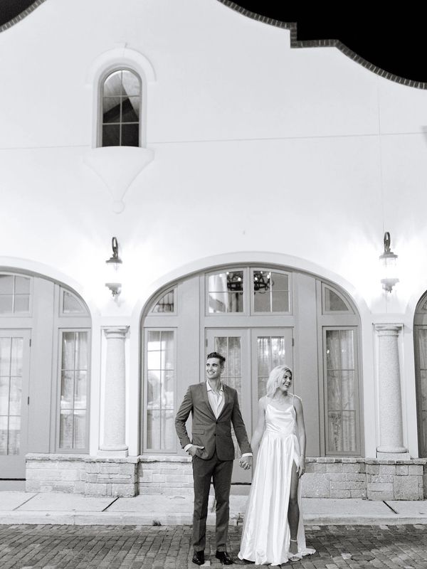 Couple standing on cobblestone street at 9 Aviles Wedding Venue https://lauraperezphotography.com