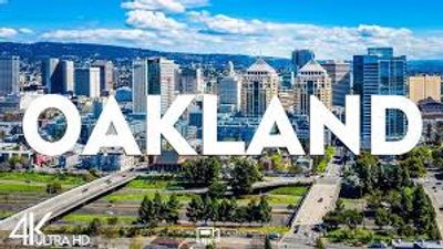 Cityscape of Oakland with bold text overlay.