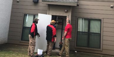 plumbers working at an apartment