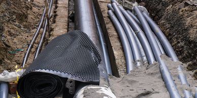 Pipes that are laying along the ground