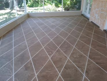Diagonal tile sunroom floor design