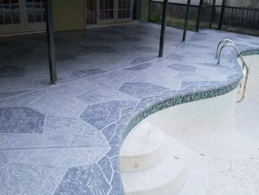 Poolside pointed flagstone deck installation