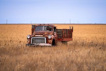 Abandoned Flatbed truck in a field in New Mexico, USA
