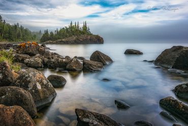 Foggy day on the North Shore of Lake Superior near Hovland, Minnesota. Blue tones and a lone island.