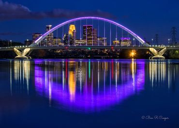 Lowry bridge in Minneapolis, Minnesota at Night. The bridge lit in purple in honor of Prince. MN
