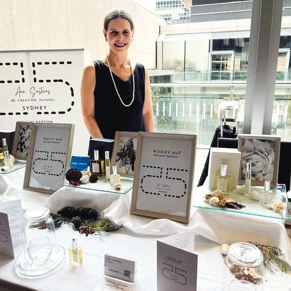 Ana Sastrias standing at ther Stall table at the Event of "A Gorgeous Excuse" Sydney Hilton Hotel