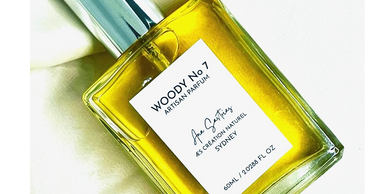 60ml spray square clear glass bottle of Woody Earthy, Amber, spicy and vanilla fragrance Woody No7 b