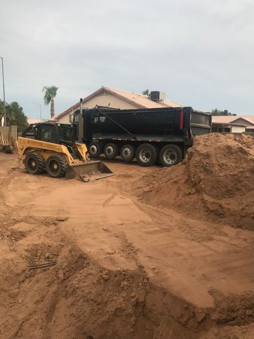 Two trucks on a construction site