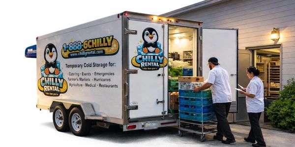 Restaurant employees transferring stock to Chilly Rental refrigerated 12' x 7' trailer
