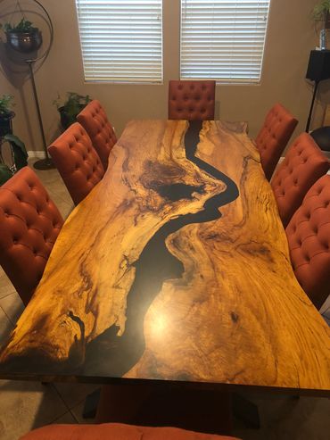 live edge dining table with black resin 