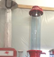 Tall Ten (10) visible gas pump cylinder tinted blue