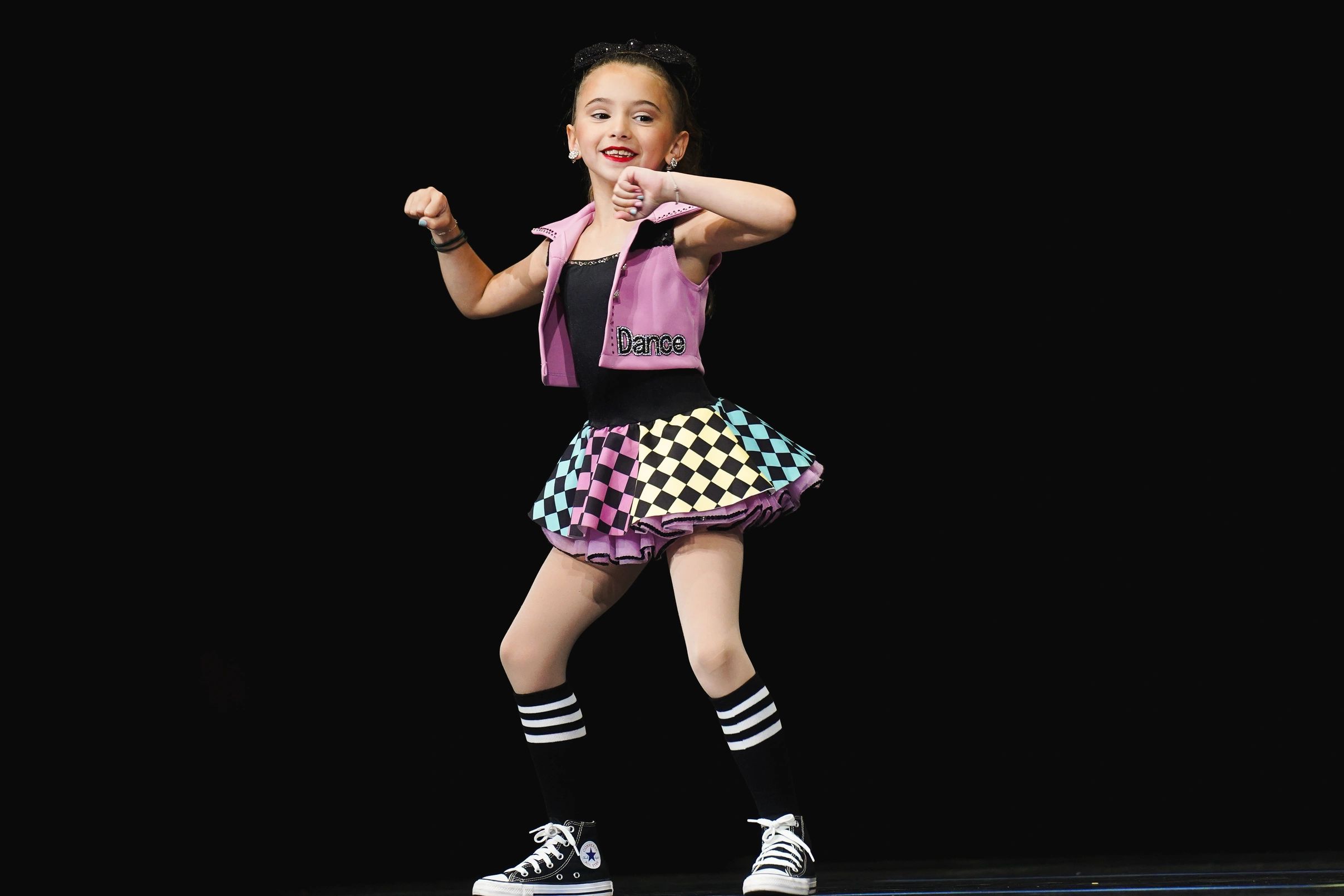 girl dancing hip hop smiling with good technique
