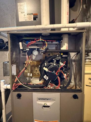 Open Affinity 9.C Series furnace showing internal wiring and components.