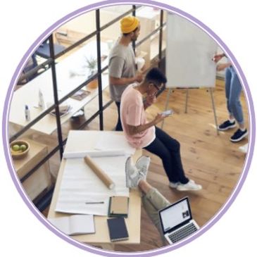 Group collaborating in a modern workspace.