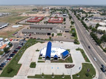 Aerial construction photography of an Amarillo National Bank branch in Amarillo, Texas, photographed for the roofing contractor after construction.