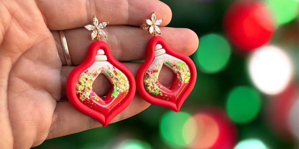 🎄 Festive, flirty, and full of cheer—these handmade polymer clay ornament earrings.