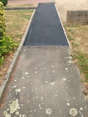 Surface rejuvenated with tarmac restorer...