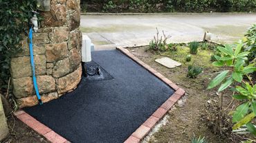 Surface revitalised using tarmac restorer...