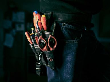 Man with fixing tools.