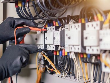 Man checking electric panel.