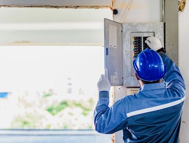 Man checking heat central unit.