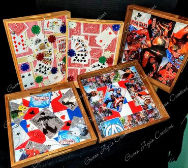 Old wooden serving trays made into game night trays with playing cards and hand-cut plexiglass top t