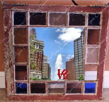 "Non-Magical" side of a window photo frame of Philly's Love Park, you're just enjoying the day alone