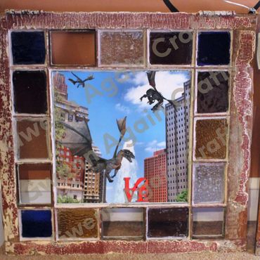 "Magical" side of a window photo frame of Philly's Love Park, watching a dragon family enjoy the day