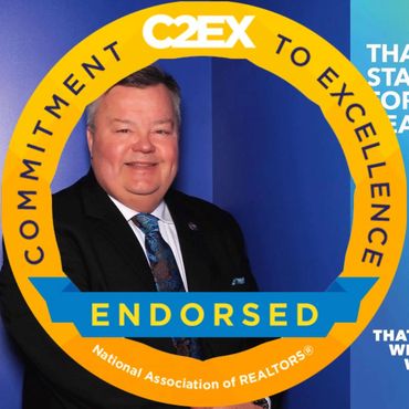 Professional man endorsed by National Association of REALTORS® for commitment to excellence.