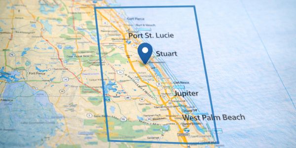 Map highlighting Florida's Treasure Coast including Port St. Lucie, Stuart, Jupiter, and West Palm Beach.