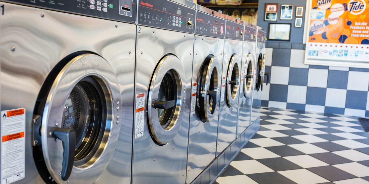 A row of washers and dryers
