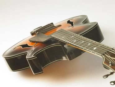 Handmade acoustic arch top guitar