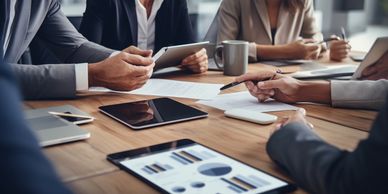 Corporate team members engaged in discussion in office