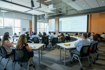 Teamwork and collaboration among employees in office space