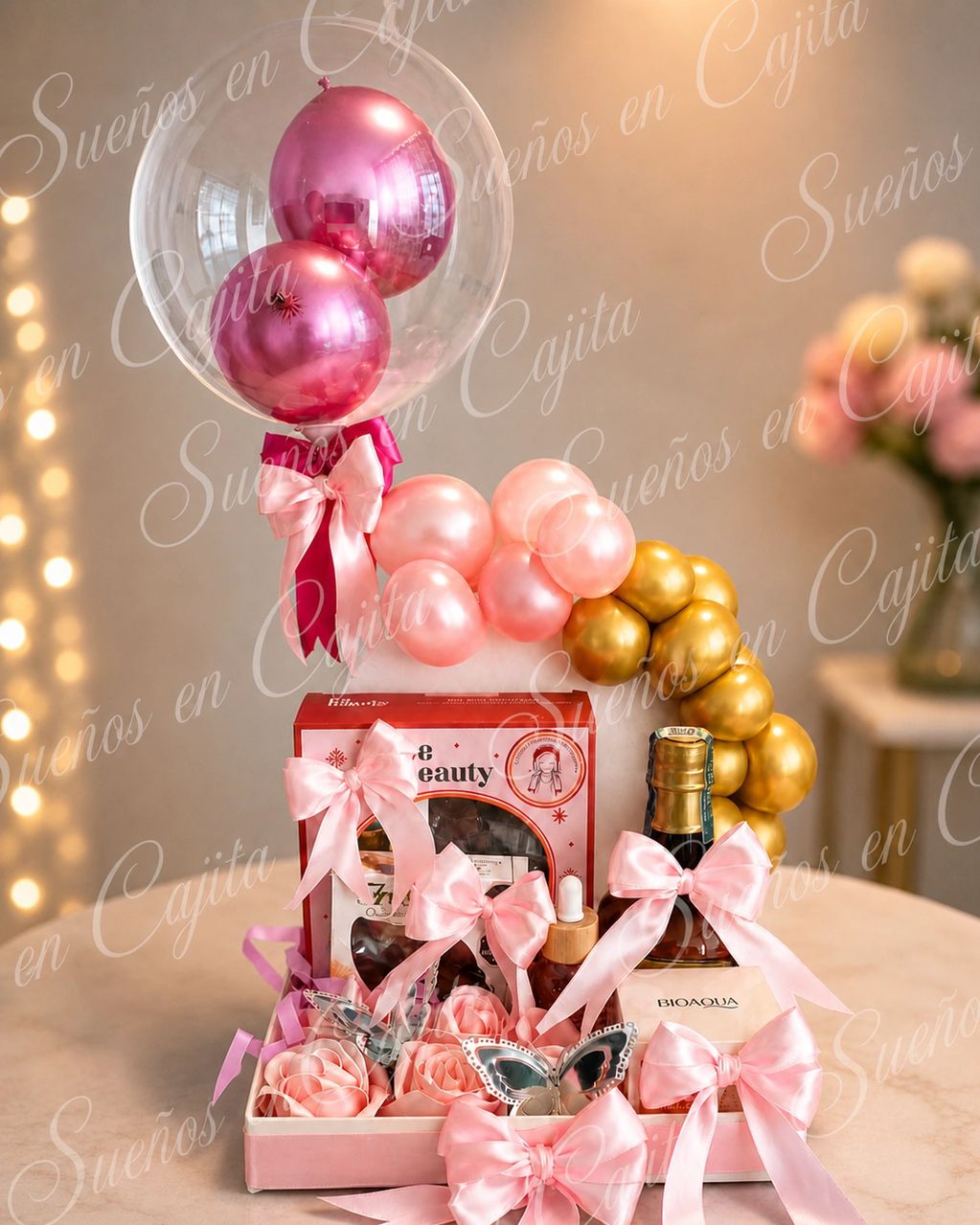 Caja de regalo elegante con globos y lazos rosados.