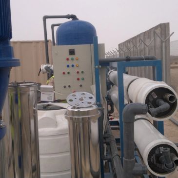 Water treatment equipment setup outdoors.